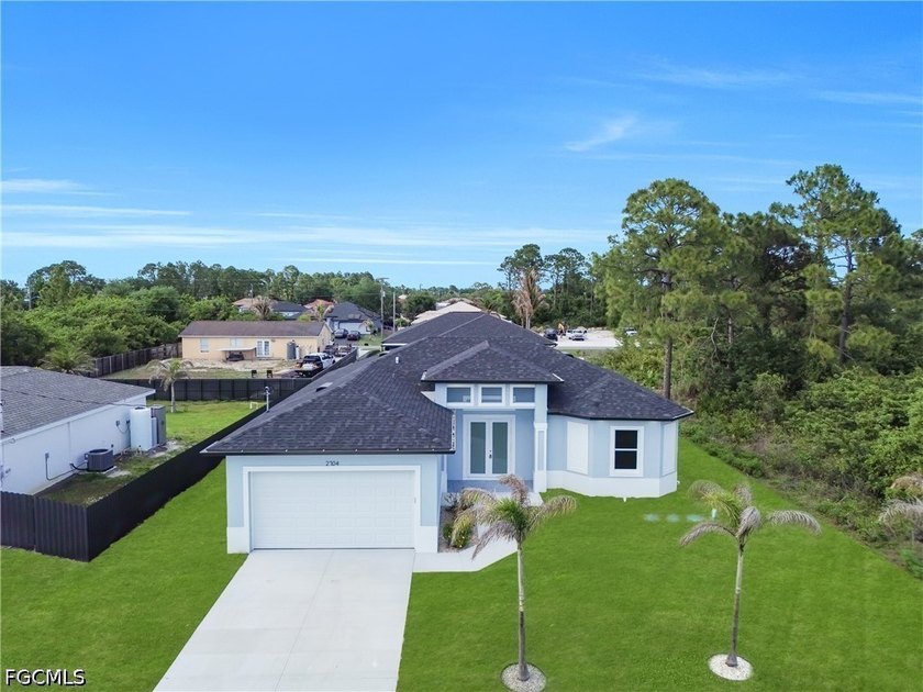 Stunning modern residence offering high ceilings, sleek tile - Beach Home for sale in Lehigh Acres, Florida on Beachhouse.com