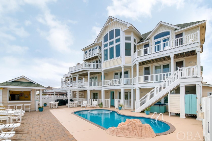 THIS HOME IS A RENTAL POWERHOUSE!! There truly are no words to - Beach Home for sale in Avon, North Carolina on Beachhouse.com