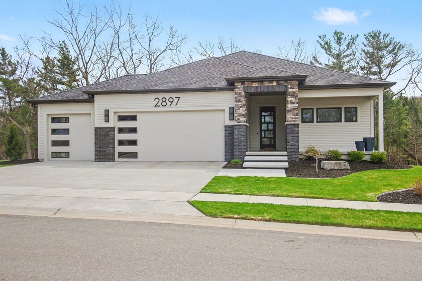 Enjoy golf course living next to Lake Michigan! This well - Beach Home for sale in Muskegon, Michigan on Beachhouse.com