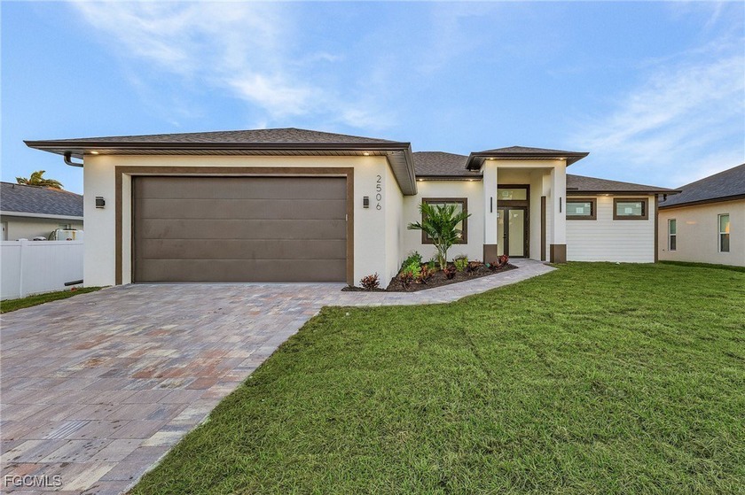 LOCATION LOCATION! Stunning new construction home featuring 4 - Beach Home for sale in Cape Coral, Florida on Beachhouse.com