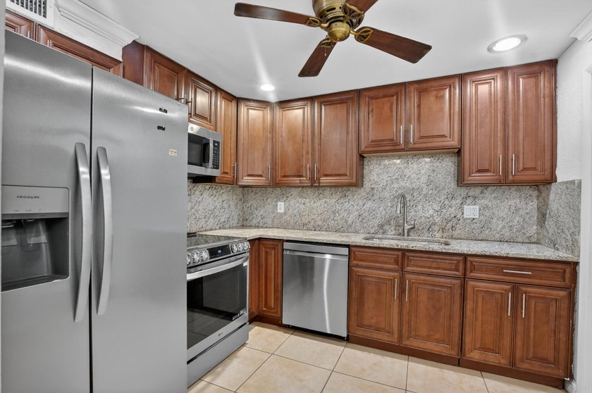 Welcome to this spacious 3-bedroom, 2-bath corner unit offering - Beach Condo for sale in Boca Raton, Florida on Beachhouse.com
