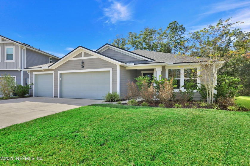 Discover this beautiful 4-bedroom, 3.5-bath split-plan home in - Beach Home for sale in Saint Johns, Florida on Beachhouse.com