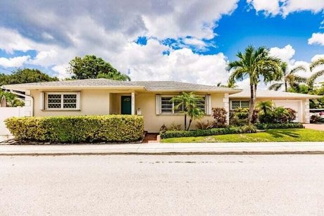 Experience coastal farmhouse charm in the highly sought-after - Beach Home for sale in Lake Worth Beach, Florida on Beachhouse.com