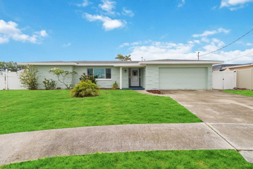 Waterfront living at its finest! Enjoy this 4 bedroom, 2 bath - Beach Home for sale in Merritt Island, Florida on Beachhouse.com