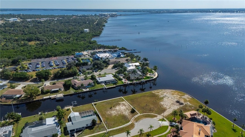 Tucked along a tranquil saltwater canal with 110 feet of - Beach Lot for sale in Port Charlotte, Florida on Beachhouse.com