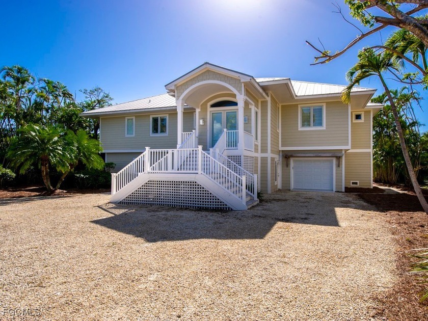 Welcome to 5095 Joewood Drive, a coastal retreat in the - Beach Home for sale in Sanibel, Florida on Beachhouse.com