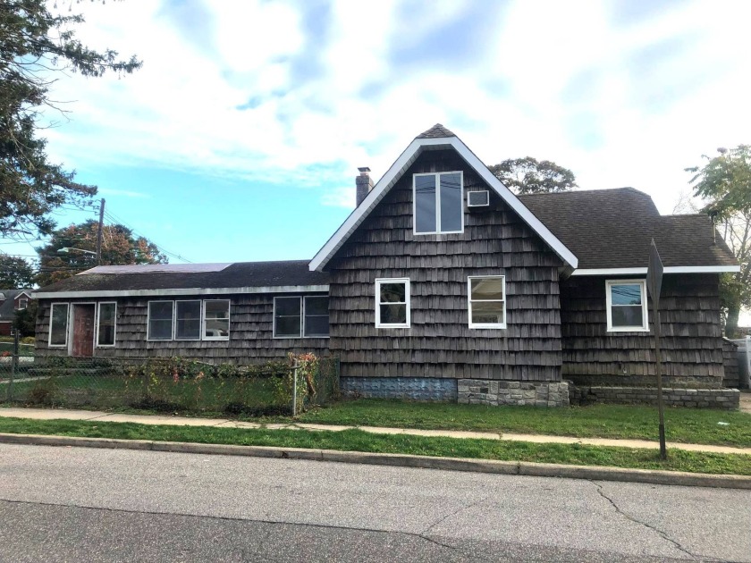 1 Family Detached Corner Property with A TON of potential and - Beach Home for sale in Freeport, New York on Beachhouse.com