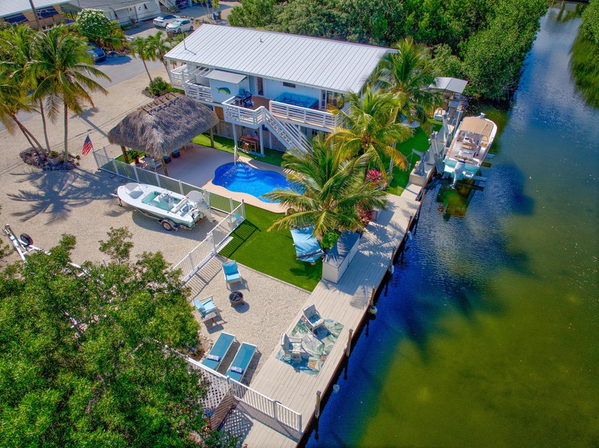 100 ft. canal-frontage, 15K boat lift, tiki hut and pool - Beach Home for sale in Big Pine Key, Florida on Beachhouse.com