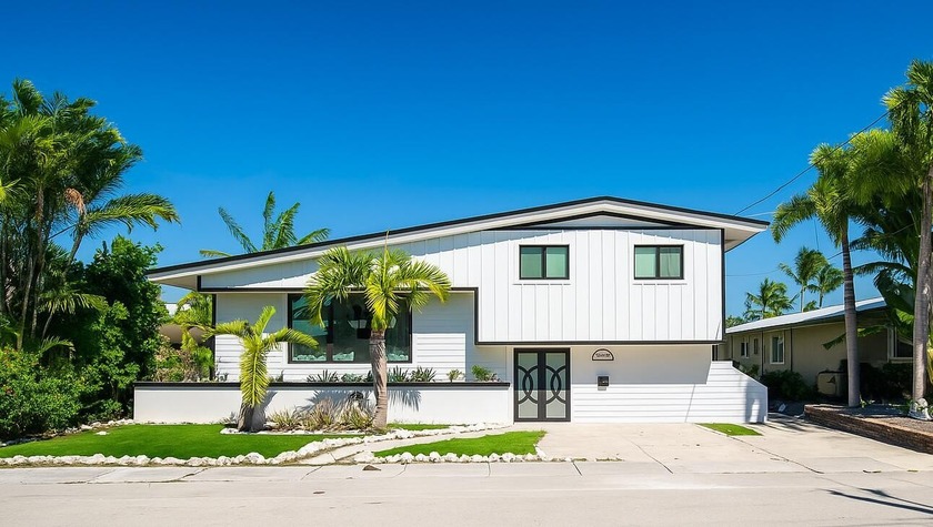 Welcome to 16 Azalea Drive, a completely reimagined home that - Beach Home for sale in Key Haven, Florida on Beachhouse.com