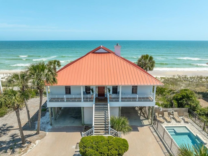 Step into your coastal sanctuary! This beachfront, 4-bedroom - Beach Home for sale in St. George Island, Florida on Beachhouse.com