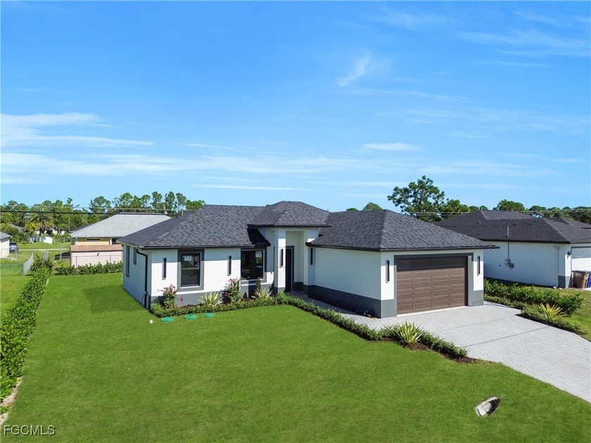READY TO MOVE IN! This stunning new construction home combines - Beach Home for sale in Lehigh Acres, Florida on Beachhouse.com