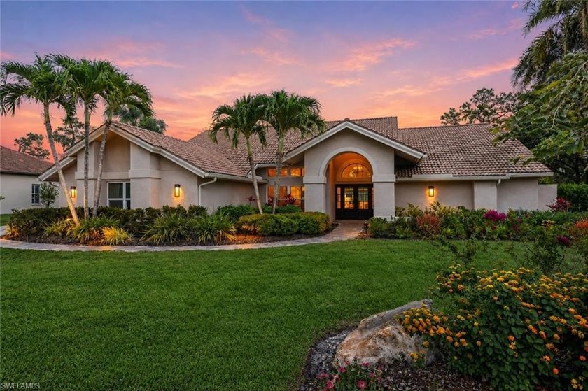 Set on an oversized 1/2 acre homesite with sweeping golf course - Beach Home for sale in Estero, Florida on Beachhouse.com