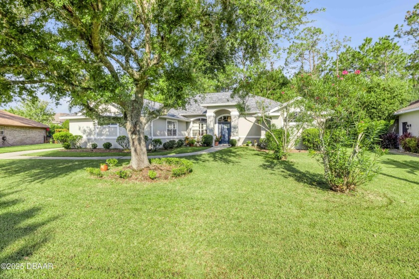 Nestled in the sought-after Hunters Ridge community, this - Beach Home for sale in Ormond Beach, Florida on Beachhouse.com