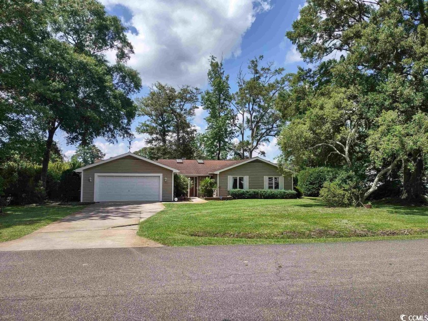 This corner lot 3 Bedroom / 2 and 1 half bath home features, 3 - Beach Home for sale in Myrtle Beach, South Carolina on Beachhouse.com