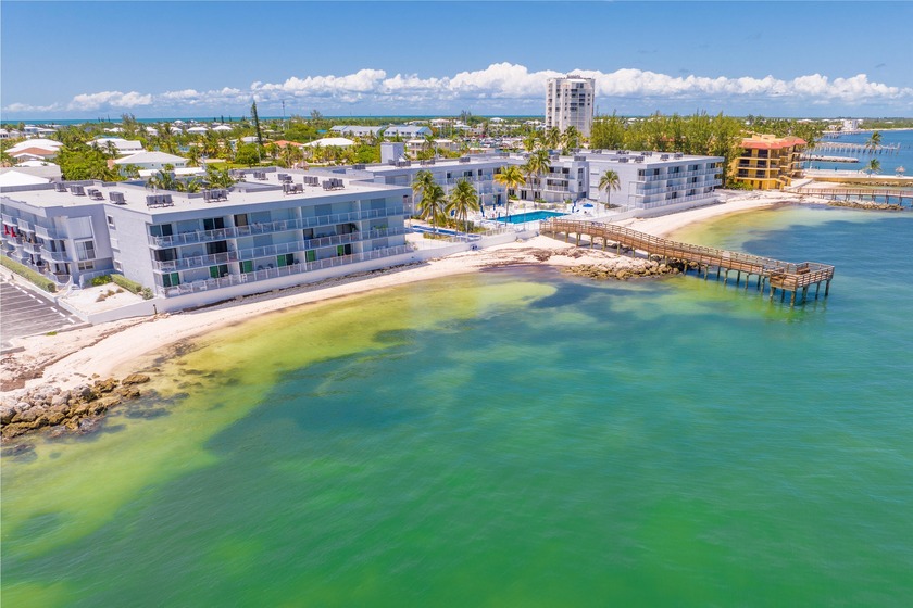 Wake up to glowing Atlantic sunrises and end your day with - Beach Condo for sale in Key Colony Beach, Florida on Beachhouse.com