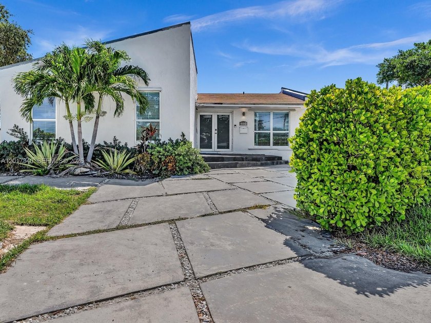 Welcome to your dream home in the exclusive Sans Souci Estates! - Beach Home for sale in North Miami, Florida on Beachhouse.com