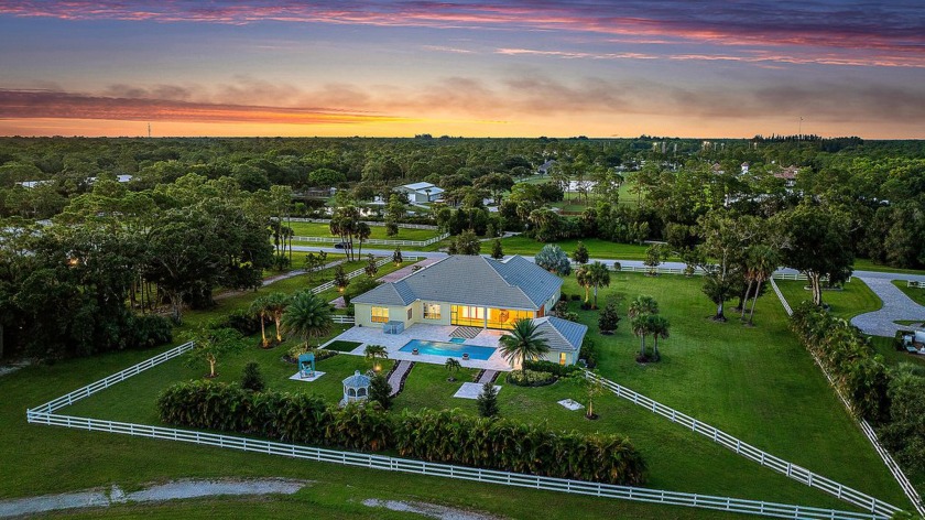 This modern luxury estate on nearly 2 acres in a gated Jupiter - Beach Home for sale in Jupiter, Florida on Beachhouse.com