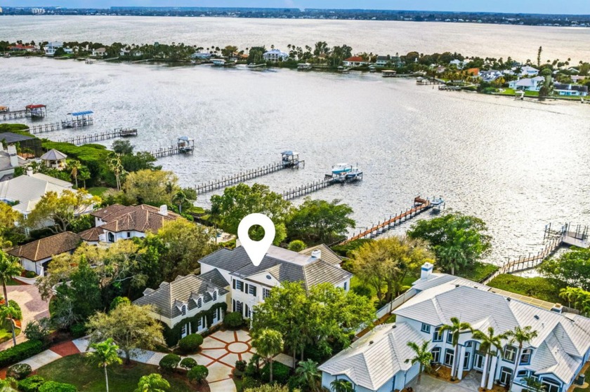 Georgian-inspired architecture & symmetrical proportions create - Beach Home for sale in Indian Harbour Beach, Florida on Beachhouse.com