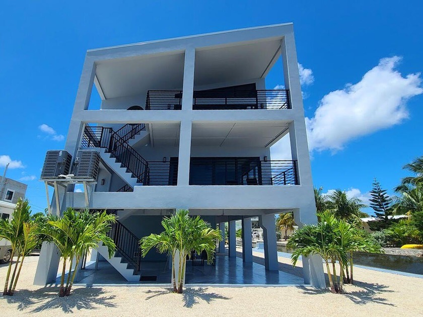 Dolphinus del Sol is a Waterfront Estate Masterpiece! Enjoy this - Beach Home for sale in Big Pine Key, Florida on Beachhouse.com