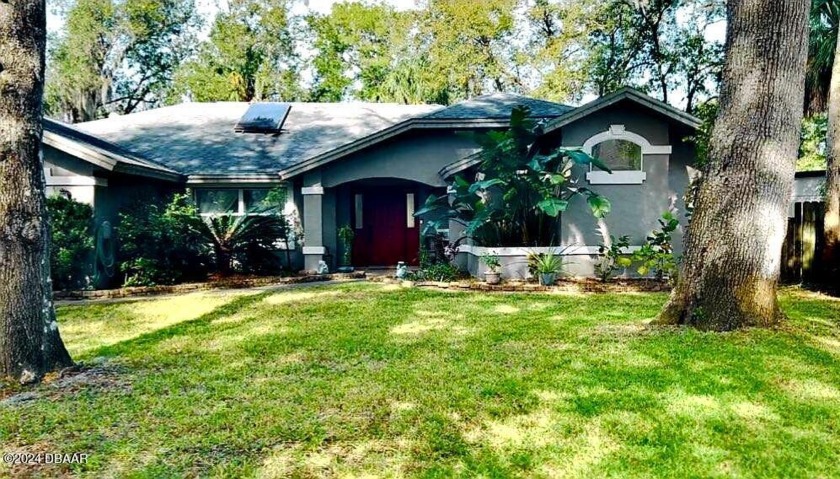 Welcome to your private oasis nestled in the serene Tomoka Oaks - Beach Home for sale in Ormond Beach, Florida on Beachhouse.com