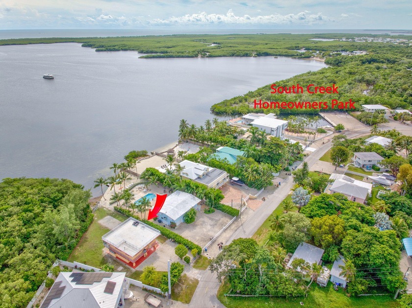 Relax and Revitalize in this Stylish Island Home! This fortified - Beach Home for sale in Key Largo, Florida on Beachhouse.com