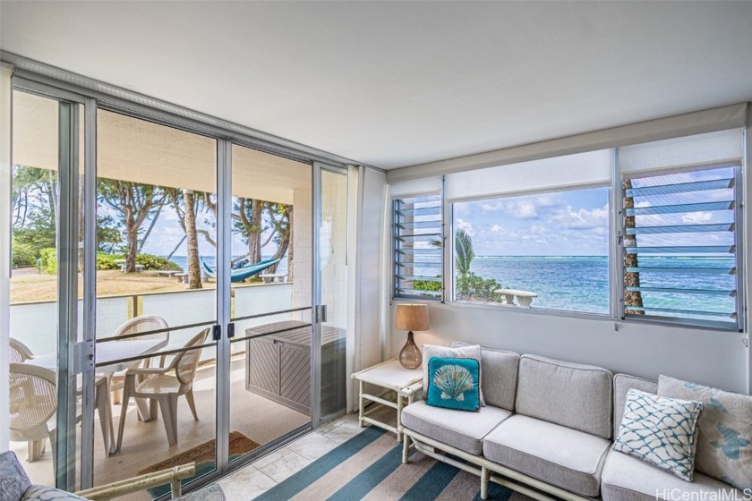 Discover the ultimate beachfront living with this rare 2-bedroom - Beach Condo for sale in Hauula, Hawaii on Beachhouse.com