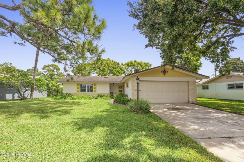 Welcome to this beautifully updated 3-bedroom, 2-bath home in a - Beach Home for sale in Daytona Beach, Florida on Beachhouse.com