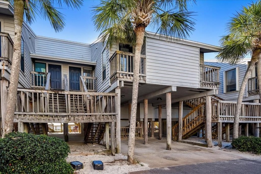 Experience the epitome of coastal living at 300 Ocean Mile I 6 - Beach Home for sale in St. George Island, Florida on Beachhouse.com