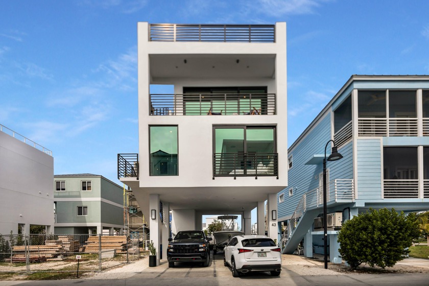Indulge in Island Nirvana in this newly constructed, coastal - Beach Home for sale in Key Largo, Florida on Beachhouse.com