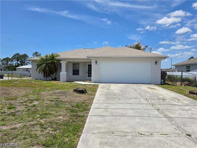 Welcome to this 3-bedroom, 2-bath single-family home in Lehigh - Beach Home for sale in Lehigh Acres, Florida on Beachhouse.com