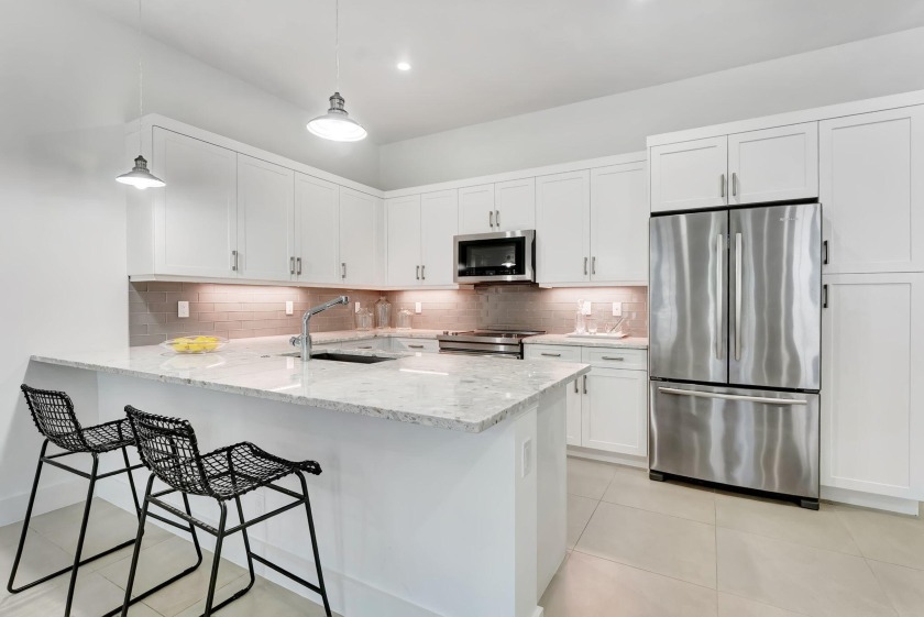 Welcome to this rarely available coastal contemporary townhome - Beach Townhome/Townhouse for sale in Delray Beach, Florida on Beachhouse.com