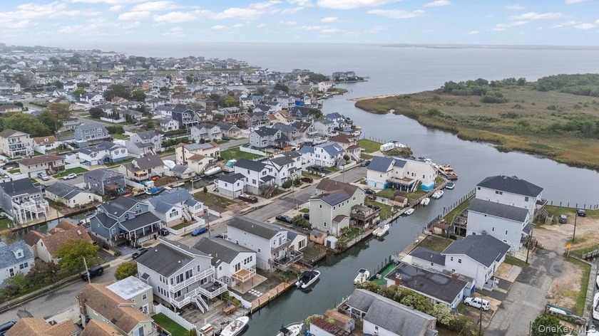 Live the waterfront lifestyle every day. Located on a quiet - Beach Home for sale in Lindenhurst, New York on Beachhouse.com