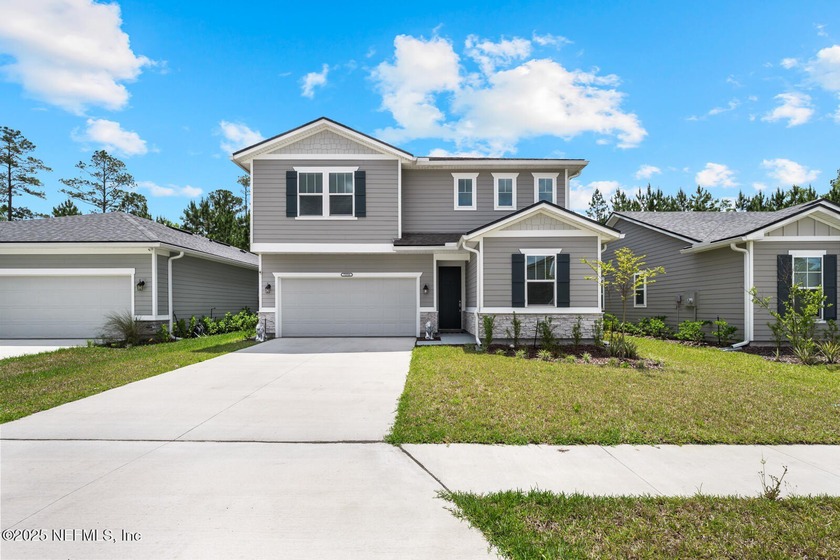Welcome to this stunning 2024-built Moonstone home offering 5 - Beach Home for sale in Yulee, Florida on Beachhouse.com