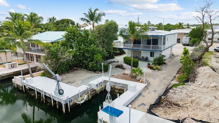 Island life is calling you! Designed for durability and style - Beach Home for sale in Key Largo, Florida on Beachhouse.com