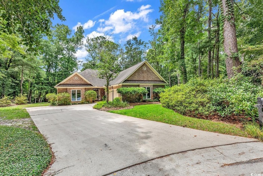 This charming single-family home, custom-built in 1992, is in a - Beach Home for sale in Pawleys Island, South Carolina on Beachhouse.com