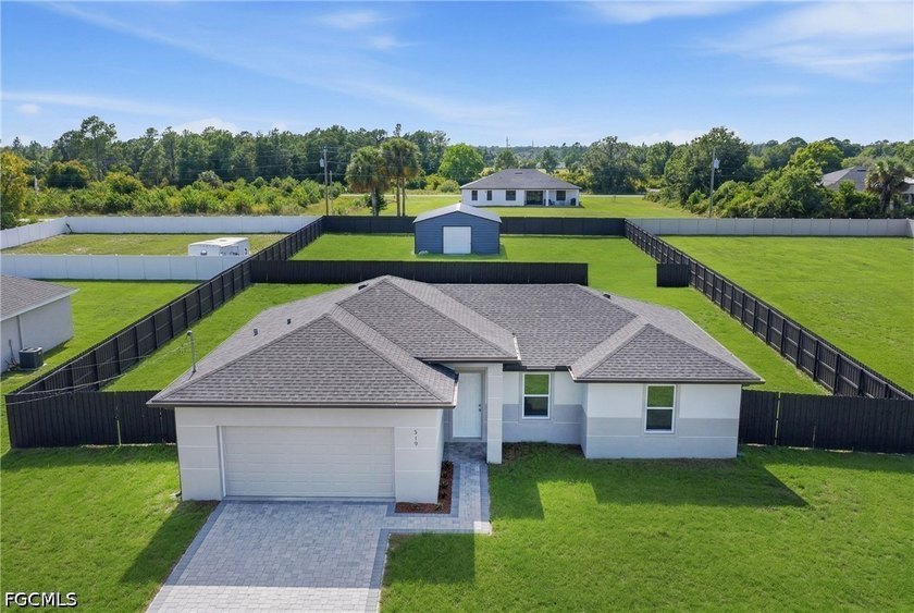 This one is a MUST see. This very unique property built on a - Beach Home for sale in Lehigh Acres, Florida on Beachhouse.com