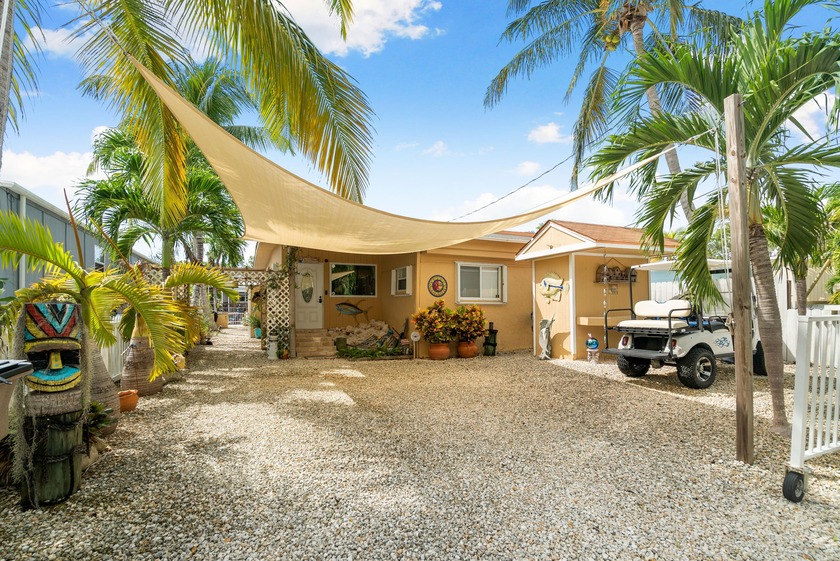 Welcome to this cozy, move-in ready canal-front mobile home in - Beach Home for sale in Key Largo, Florida on Beachhouse.com