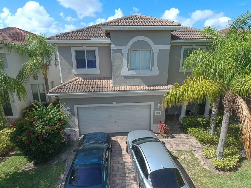 RARE FIND IN PALM BEACH!! YOU CAN WORK FROM ANYWHERE, WHY NOT A - Beach Home for sale in Riviera Beach, Florida on Beachhouse.com