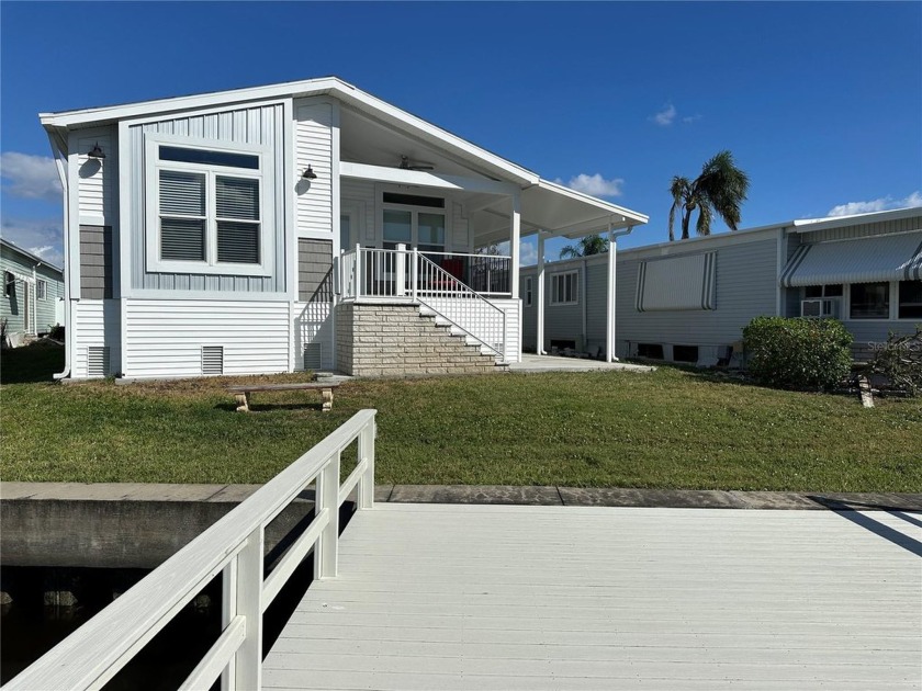 WATERFRONT living at its finest! HIGH & DRY!!! This lovely 2 - Beach Home for sale in St. Petersburg, Florida on Beachhouse.com