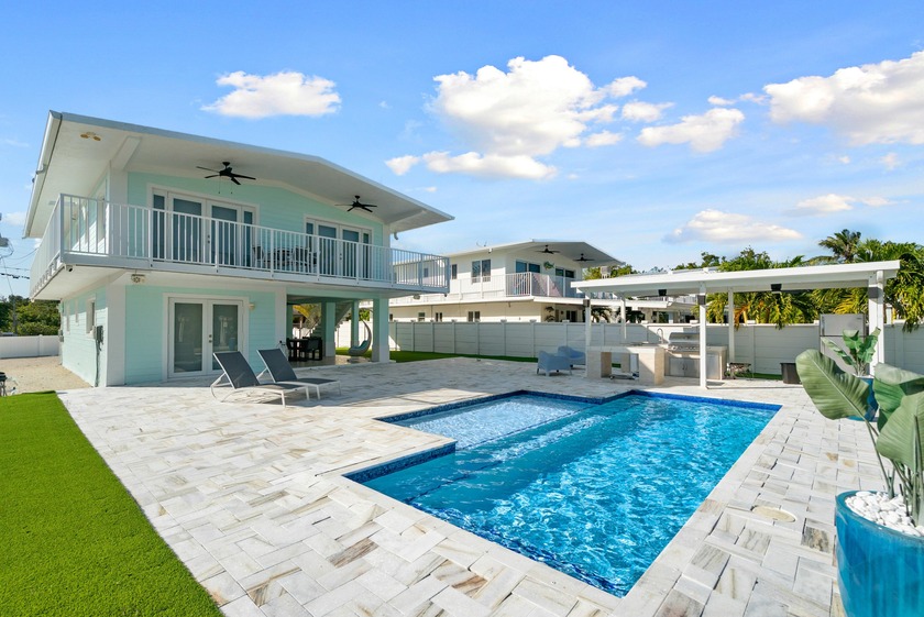 Beautiful Canal-Front Pool Home! Your dream of owning a piece of - Beach Home for sale in Key Largo, Florida on Beachhouse.com