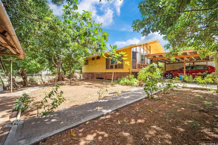 Discover a rare opportunity in the heart of Waipahu, a lovingly - Beach Home for sale in Waipahu, Hawaii on Beachhouse.com
