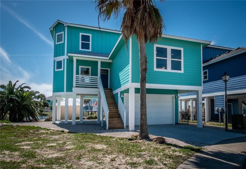 PRICE IMPROVEMENT** Perfectly located halfway between North - Beach Home for sale in Port Aransas, Texas on Beachhouse.com
