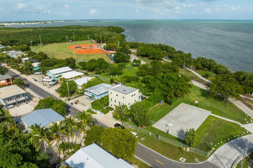 Welcome to your coastal retreat in Tavernier--just steps from - Beach Home for sale in Key Largo, Florida on Beachhouse.com