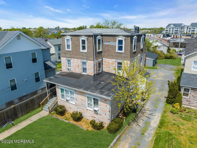Discover this exceptional 4-unit property at 93 N Broadway - Beach Home for sale in Long Branch, New Jersey on Beachhouse.com