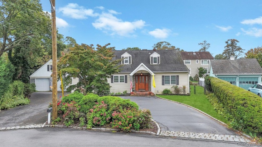 Welcome to your waterfront dream home! This expansive Cape - Beach Home for sale in Oakdale, New York on Beachhouse.com