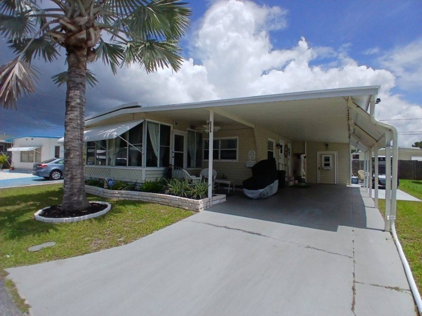 Welcome to your new home in the prestigious Bayside Waters, a - Beach Home for sale in Clearwater, Florida on Beachhouse.com