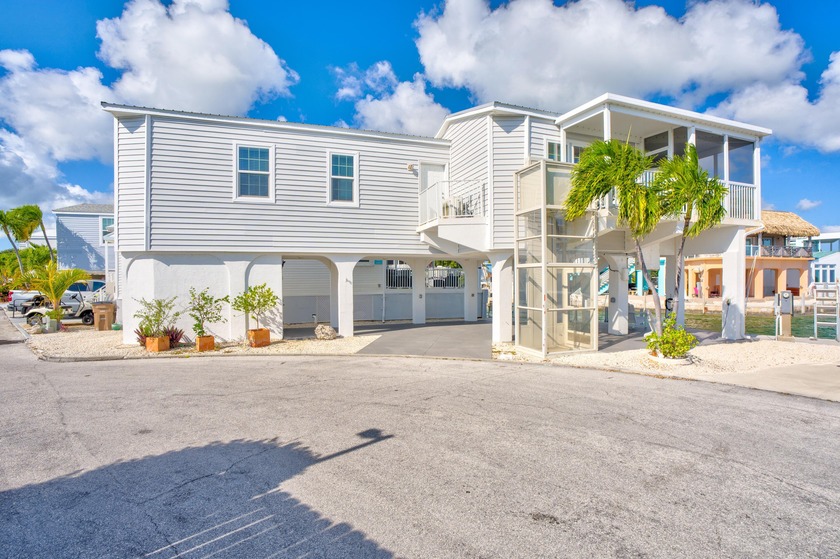 Luxurious Waterfront Living - Welcome to your perfect coastal - Beach Home for sale in Cudjoe Key, Florida on Beachhouse.com
