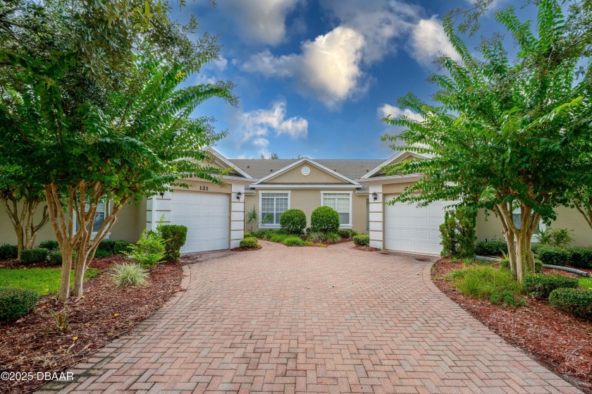 This beautifully maintained 2-bed, 2-bath single-level townhome - Beach Home for sale in Daytona Beach, Florida on Beachhouse.com