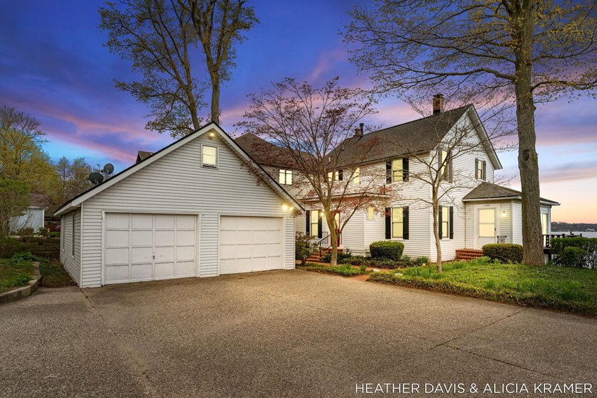 Discover an exceptional opportunity to own a charming waterfront - Beach Home for sale in Holland, Michigan on Beachhouse.com