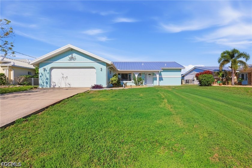 Spacious 2,000+ sq ft home with stunning views of Spring Lake - Beach Home for sale in Port Charlotte, Florida on Beachhouse.com